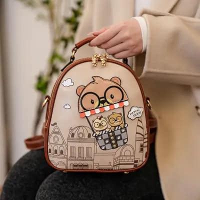 کیف وارداتی تدی بند چرمی قهوه‌ای و یاسی