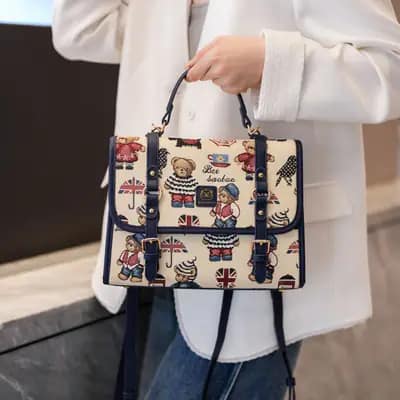 کیف وارداتی تدی جنس کنف بند چرمی سرمه‌ای 