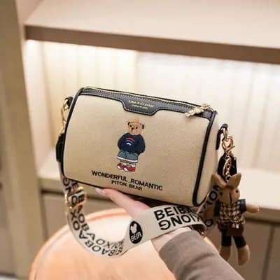 کیف وارداتی تدی گلدوزی جنس کنف بند برزنتی قهوه‌ای و کرمی
