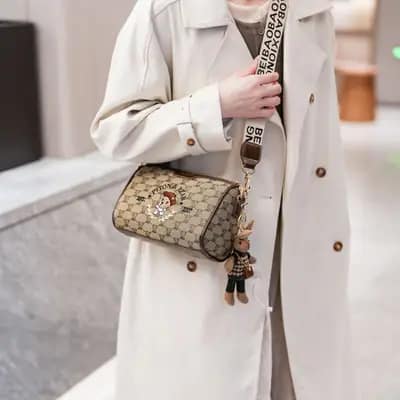 کیف وارداتی تدی گلدوزی جنس کنف بند برزنتی قهوه‌ای و کرمی
