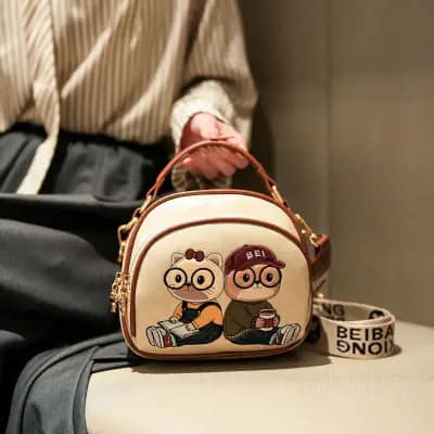 کیف وارداتی تدی گلدوزی بند برزنتی قهوه‌ای و کرمی