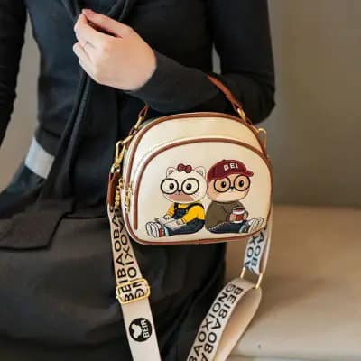 کیف وارداتی تدی گلدوزی بند برزنتی قهوه‌ای و کرمی