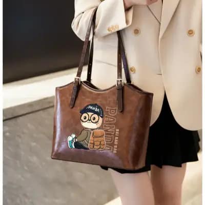 کیف وارداتی تدی گلدوزی بند چرمی قهوه‌ای و کرمی