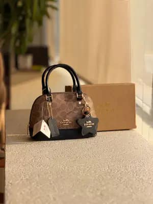 کیف زنانه کوچ آلما مسترکوالیتی فول پک M-1038