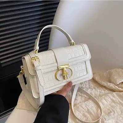 کیف مجلسی زنانه رنگ صورتی با بافت کروکودیل مدل رونیکا