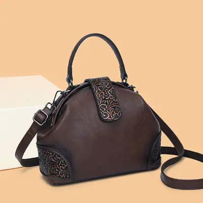 کیف چرم وارداتی مدل باروک رنگ قهوه ای سوخته با نقوش برجسته اسلیمی