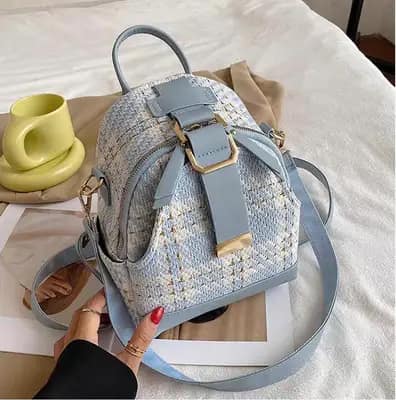 کوله پشتی وارداتی زنانه مدل لاریسا با بافت پشمی تویید آبی روشن و سگک طلایی
